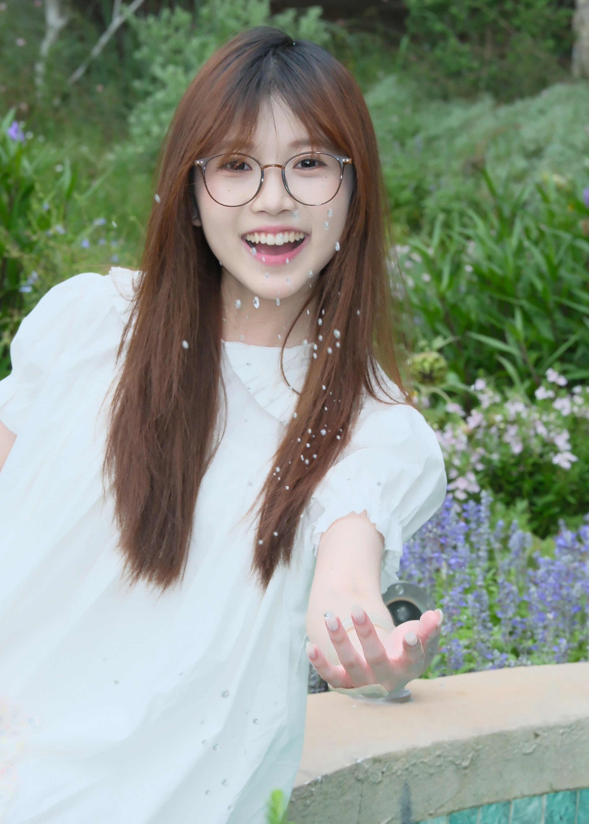 Smiling portrait in a garden