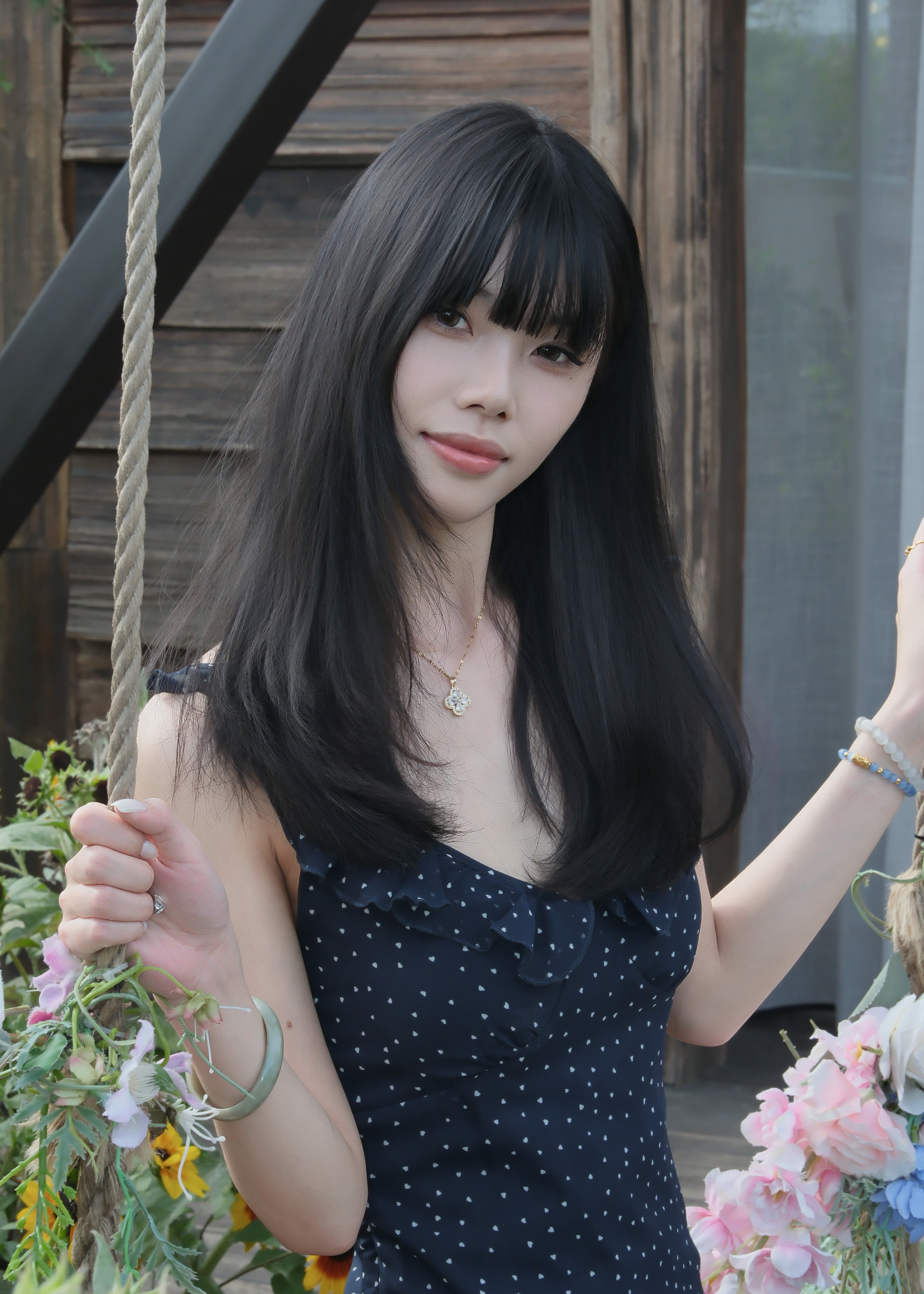 Garden portrait in a dark dress