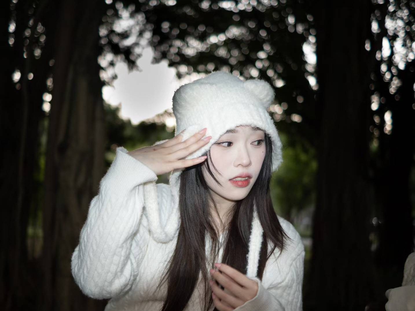 Wide portrait wearing a white hat