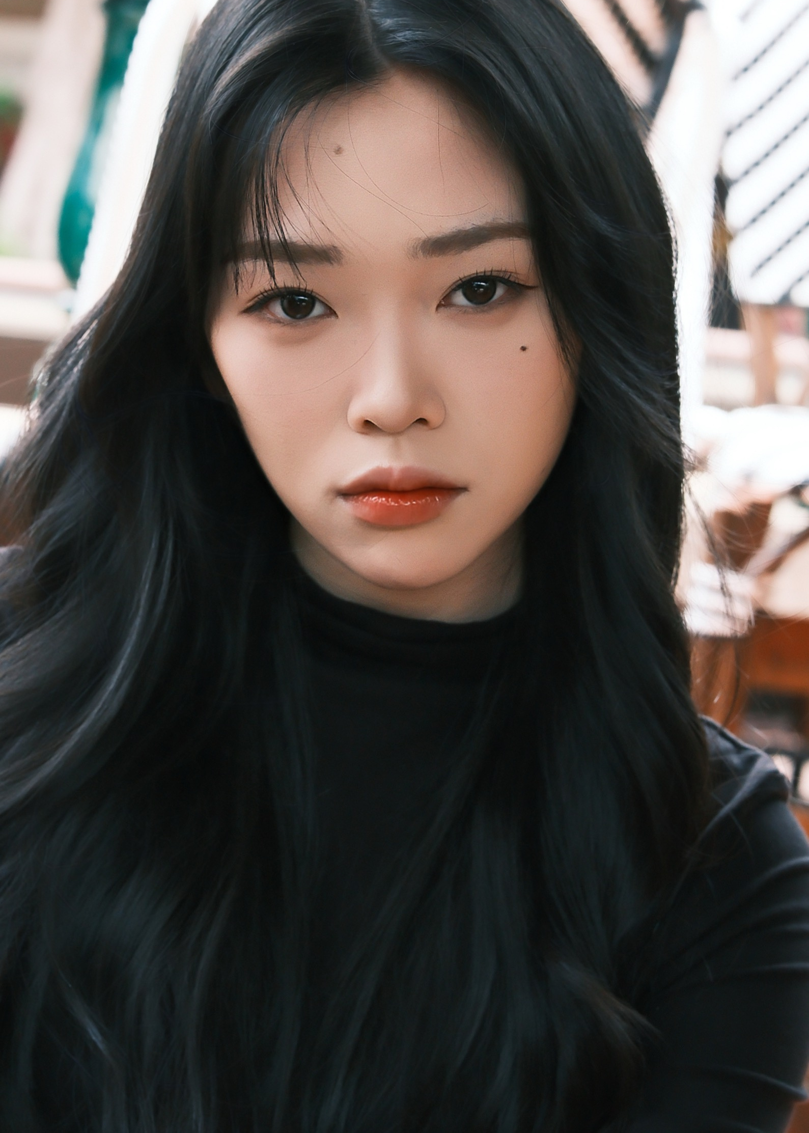 Close-up portrait in a black top